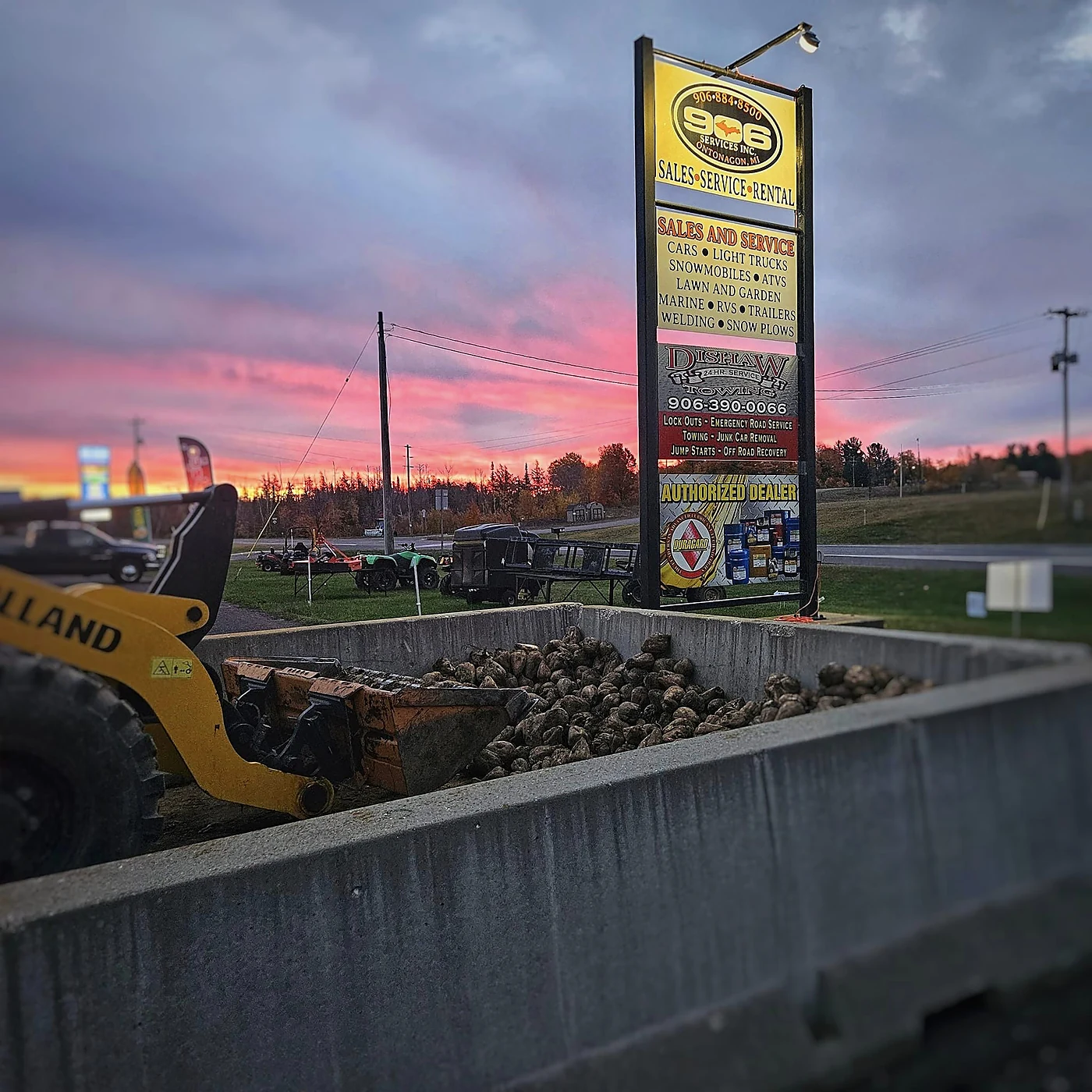 906 Services sign at sunset